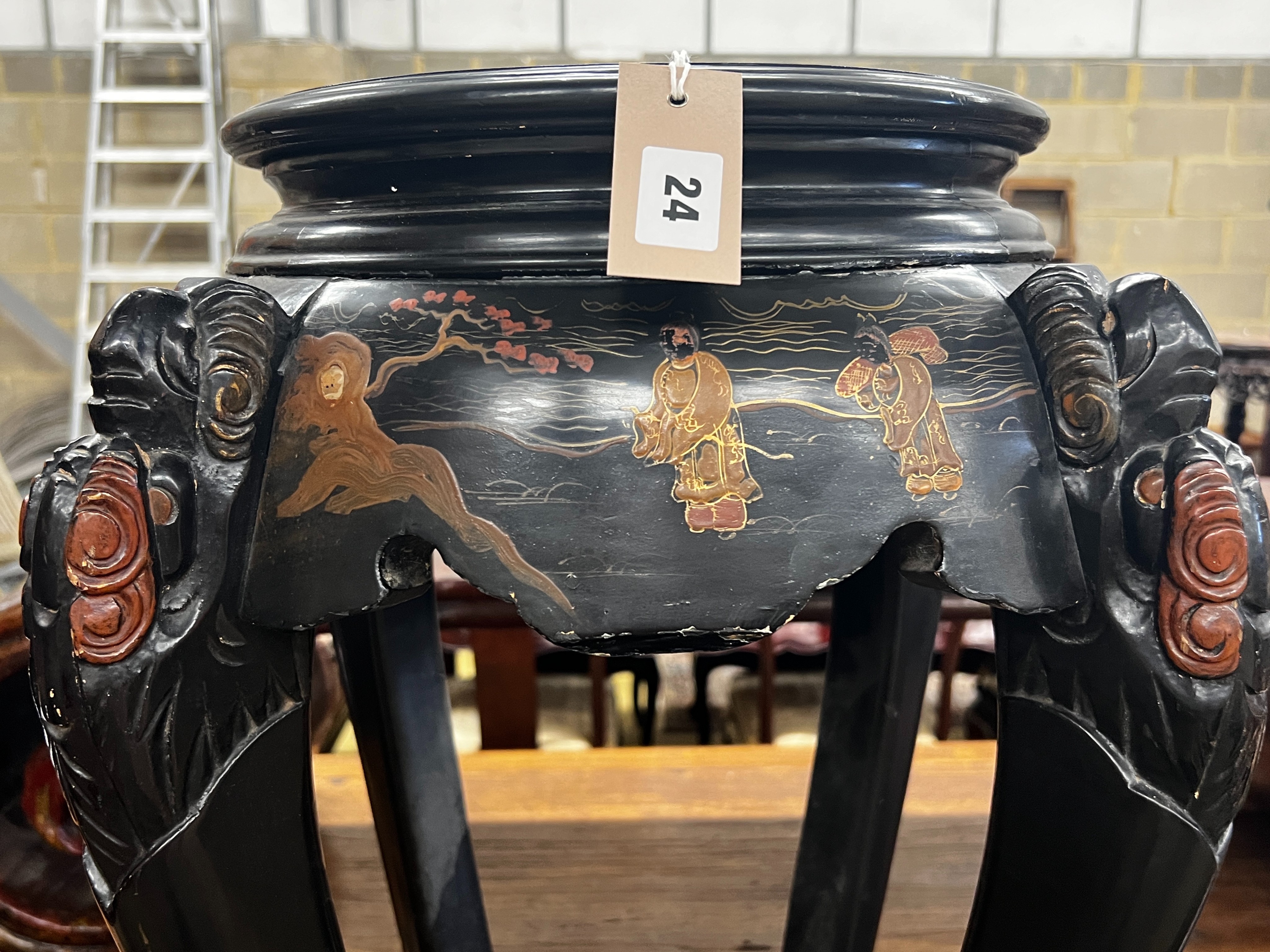 A Japanese lacquer two tier vase stand, height 76cm